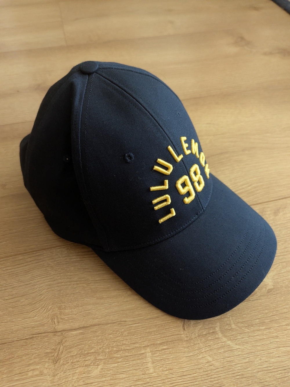 Lululemon Navy Cap with Yellow Embroidery